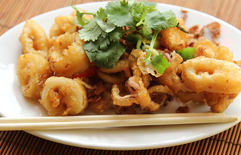 Stir-Fried baby Calamari with Mild, pickled Chili. 轻度，腌辣椒，炒出炸鱿鱼. Photograph Copyright 2012 Chuck Dorris, eDining.us. All Rights Reserved